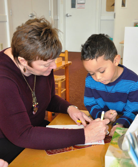 student working childcare montessori preschool lancaster northborough ma